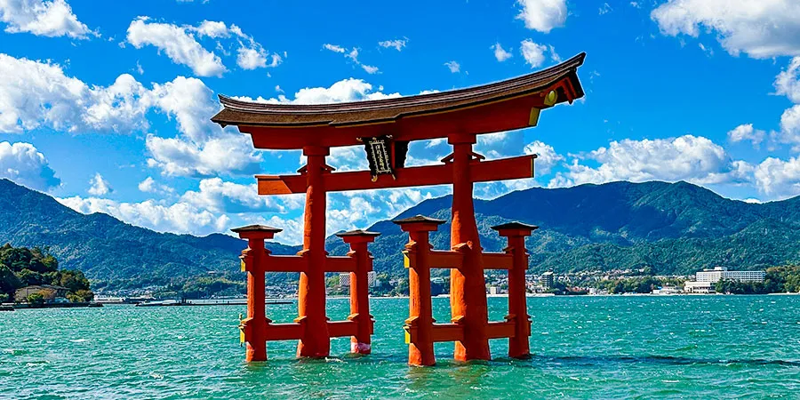 The great vermilion torii gate standing in the sea at Itsukushima shrine, near Hiroshima