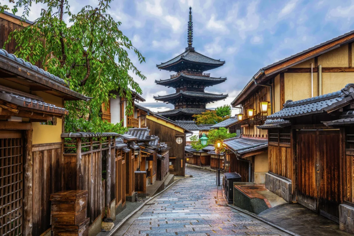 An old Kyoto lane of wooden townhouses beneath the Yasaka pagoda